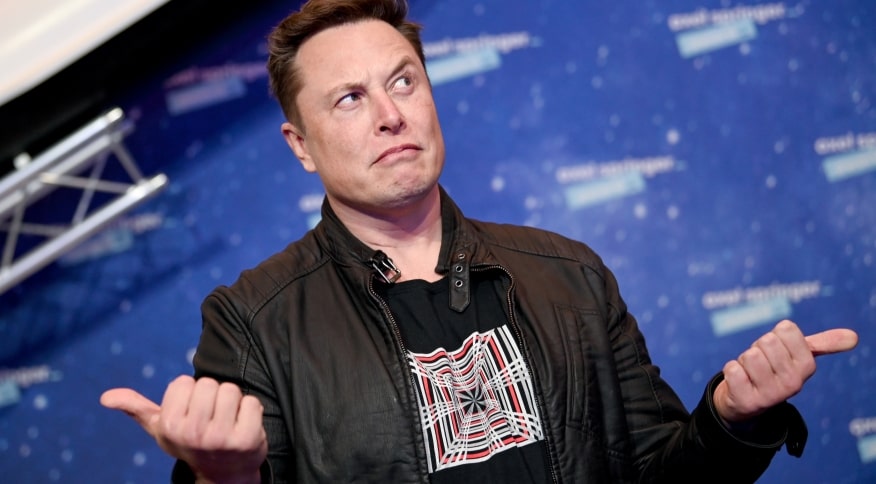 Elon Musk cobra Changpeng Zhao da Binance por atrasos de saques de Dogecoin